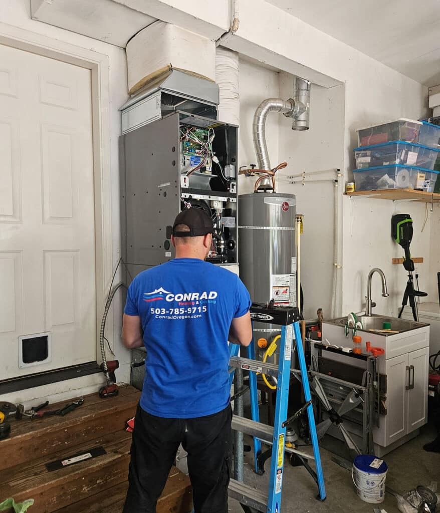 Conrad HVAC fixing furnace in house